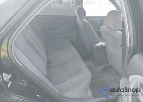 2001 Toyota Camry Le z USA, uszkodzony, nr VIN JT2BG22K410586565